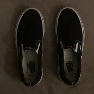 Black slip on vans with white sole